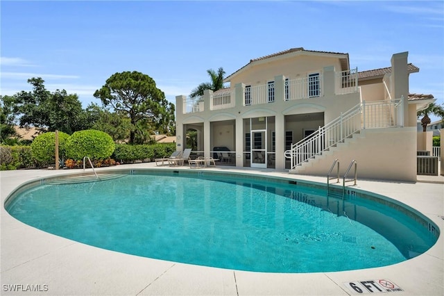 view of pool with a patio