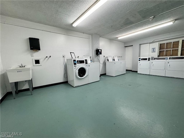 laundry room with independent washer and dryer