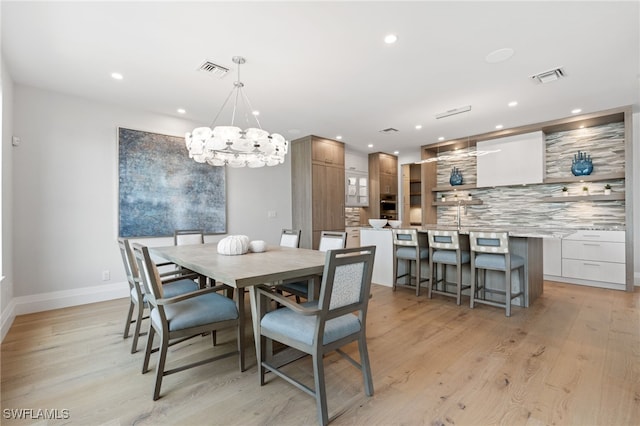 dining space featuring light hardwood / wood-style flooring