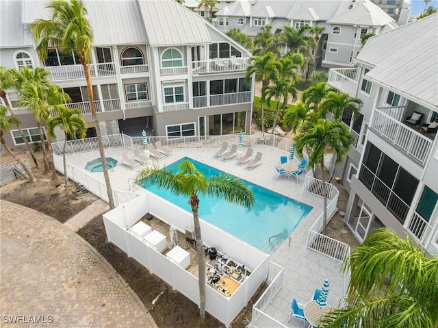 view of swimming pool with a patio