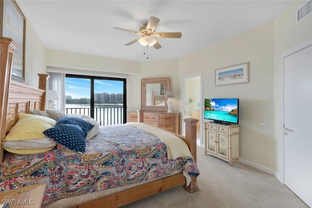 carpeted bedroom featuring ceiling fan and access to outside