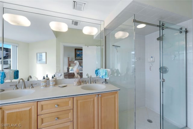 bathroom with vanity and walk in shower