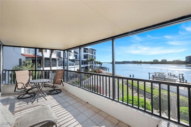 balcony featuring a water view