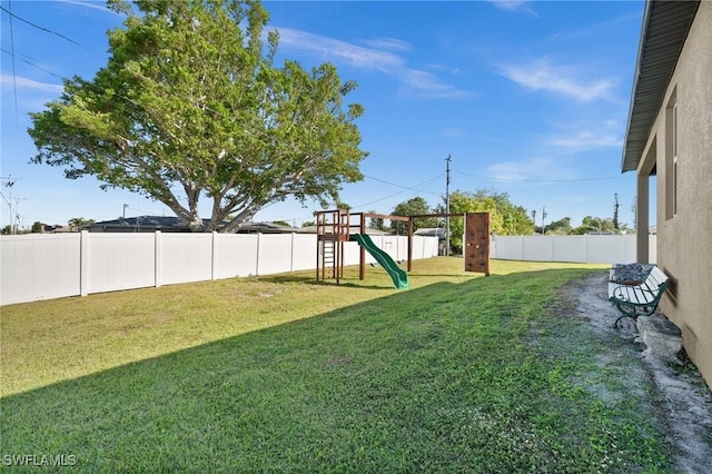 view of yard featuring a playground