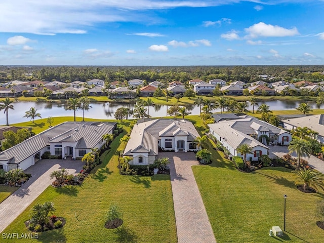 birds eye view of property featuring a water view