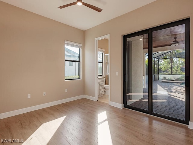 unfurnished room with light hardwood / wood-style floors and ceiling fan