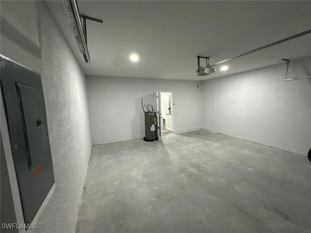 942 Sunrise Blvd, Lehigh Acres, FL 33974 - garage with a garage door opener, water heater, electric panel, and recessed lighting