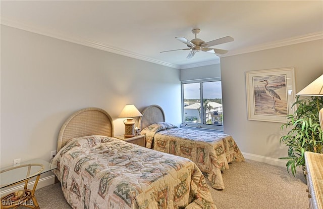 bedroom with carpet floors, ceiling fan, and ornamental molding