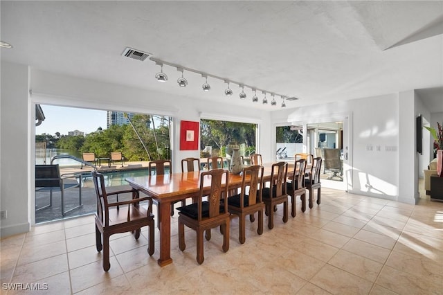 319 Pirates Bight, Naples, FL 34103 - dining area featuring visible vents and light tile patterned flooring