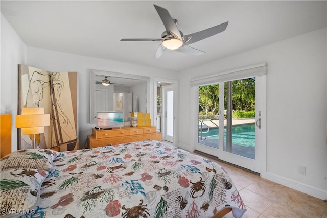 319 Pirates Bight, Naples, FL 34103 - tiled bedroom featuring access to outside, a ceiling fan, and baseboards