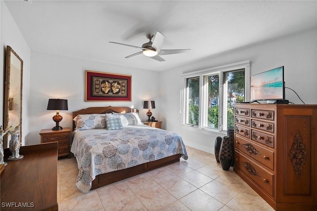 319 Pirates Bight, Naples, FL 34103 - bedroom featuring light tile patterned floors, baseboards, and a ceiling fan