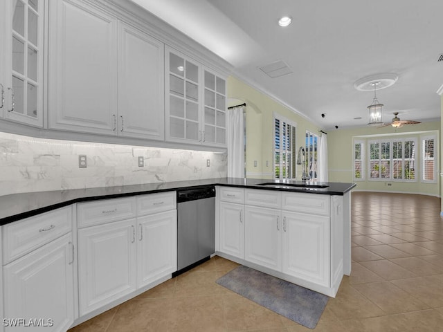 kitchen with dishwasher, ceiling fan, white cabinets, light tile patterned flooring, and sink