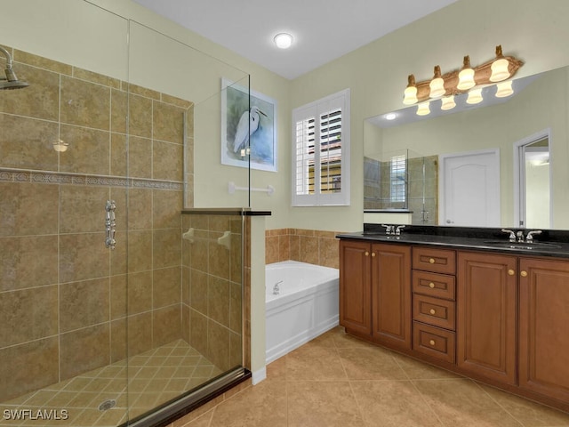 bathroom with vanity, tile patterned flooring, and independent shower and bath