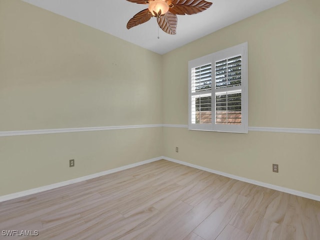 spare room with ceiling fan