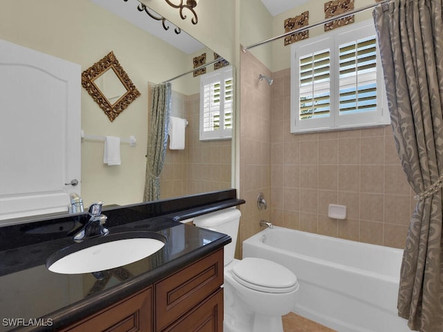 full bathroom with toilet, vanity, and shower / bathtub combination with curtain