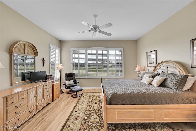 9209 Garden Pointe, Fort Myers, FL 33908 - bedroom featuring multiple windows, wood-type flooring, and ceiling fan