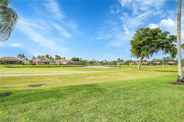 9209 Garden Pointe, Fort Myers, FL 33908 - surrounding community with a lawn