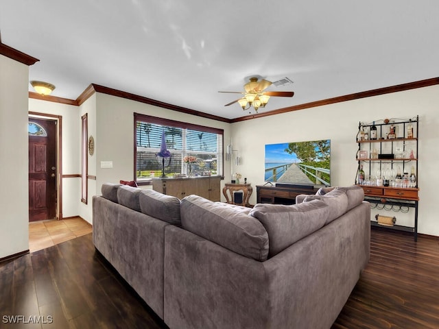 living room with ceiling fan, hardwood / wood-style floors, and ornamental molding