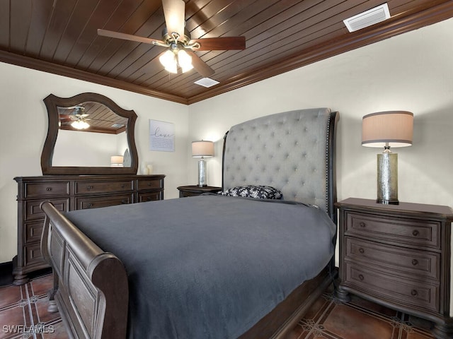 bedroom featuring dark tile patterned flooring, ceiling fan, ornamental molding, and wood ceiling