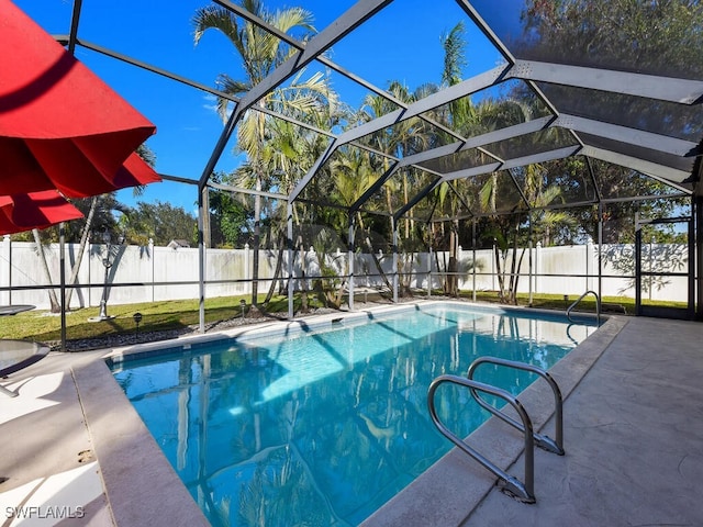 view of pool featuring a patio and a lanai