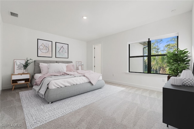 bedroom featuring carpet