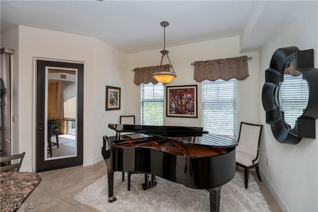 miscellaneous room with light tile patterned floors