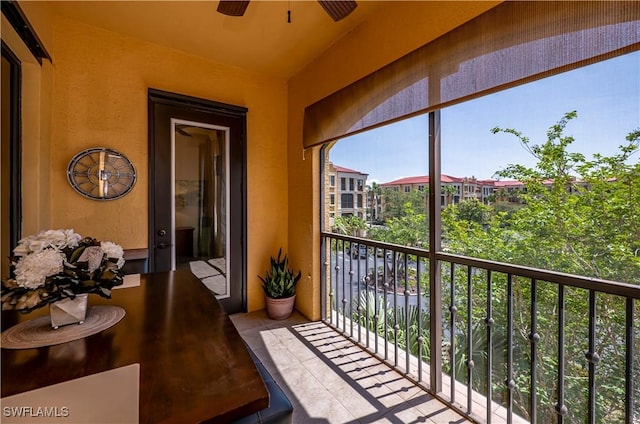 balcony featuring ceiling fan