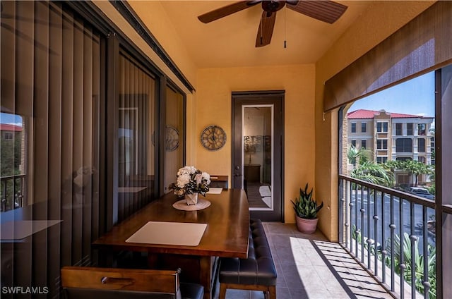 balcony featuring ceiling fan