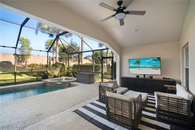 view of patio / terrace featuring an outdoor hangout area, ceiling fan, a lanai, and a pool with hot tub