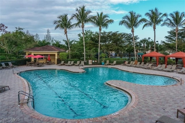 view of swimming pool featuring a gazebo and a patio