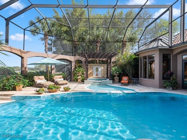 view of swimming pool featuring a patio area, a lanai, a pergola, and an in ground hot tub