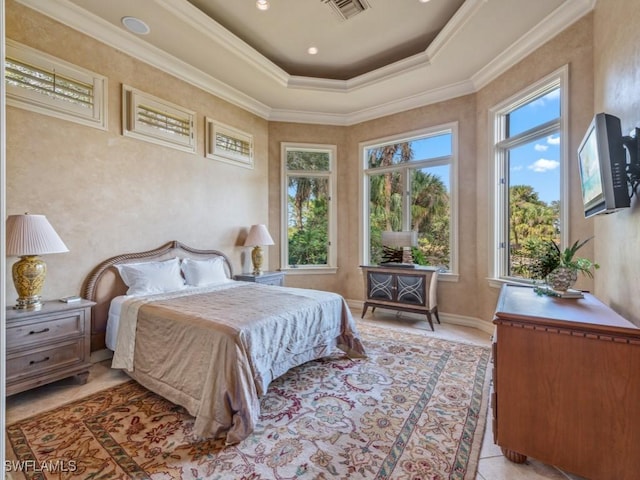 tiled bedroom featuring a raised ceiling and ornamental molding