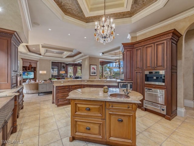 kitchen featuring a center island, decorative light fixtures, and ornamental molding