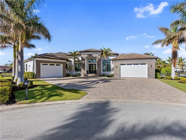 view of front of property featuring a garage