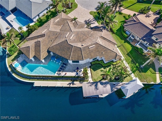 birds eye view of property featuring a water view