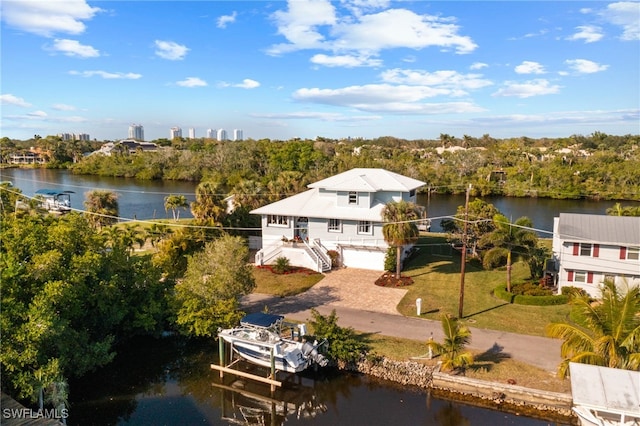 drone / aerial view featuring a water view