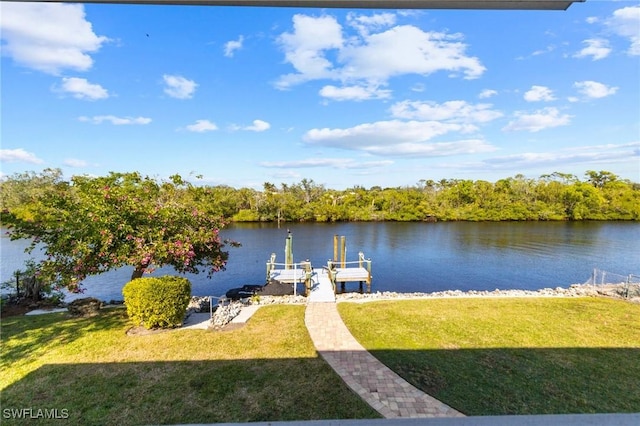 dock area featuring a yard and a water view