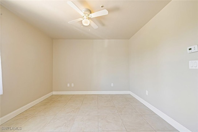 3968 Aloha Ln, Bonita Springs, FL 34134 - empty room with a ceiling fan and light marble finish floors
