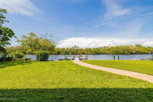 3968 Aloha Ln, Bonita Springs, FL 34134 - dock area with a yard and a water view