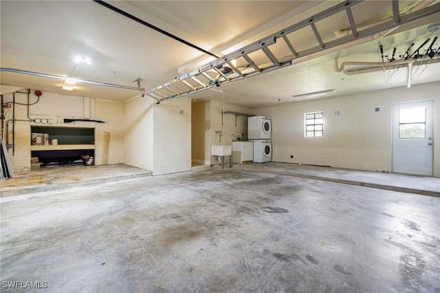 3968 Aloha Ln, Bonita Springs, FL 34134 - garage with stacked washer and clothes dryer and a sink