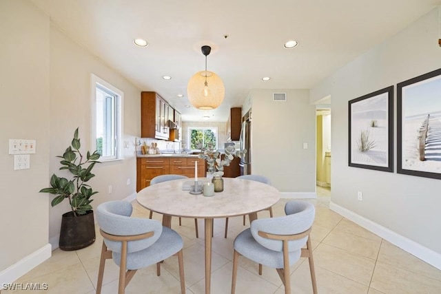3968 Aloha Ln, Bonita Springs, FL 34134 - dining space with recessed lighting and light tile patterned floors