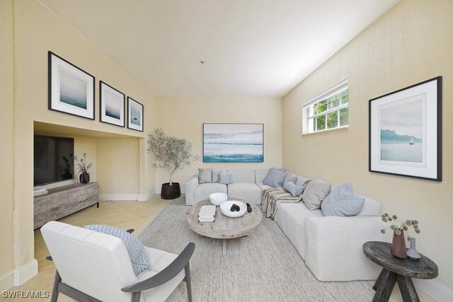 3968 Aloha Ln, Bonita Springs, FL 34134 - living area with baseboards and light tile patterned floors