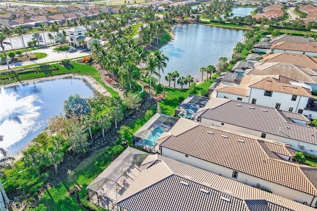 aerial view featuring a residential view and a water view