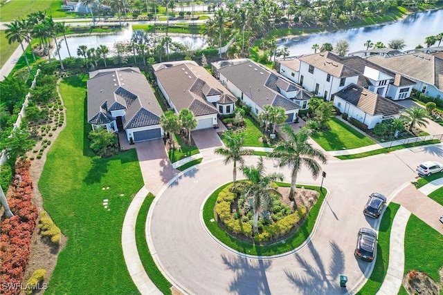 aerial view with a residential view and a water view