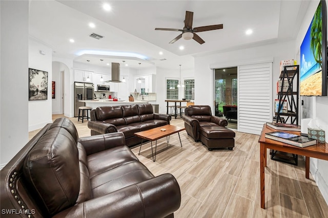 living room featuring ceiling fan