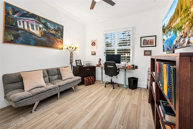 home office with crown molding, light hardwood / wood-style flooring, and ceiling fan