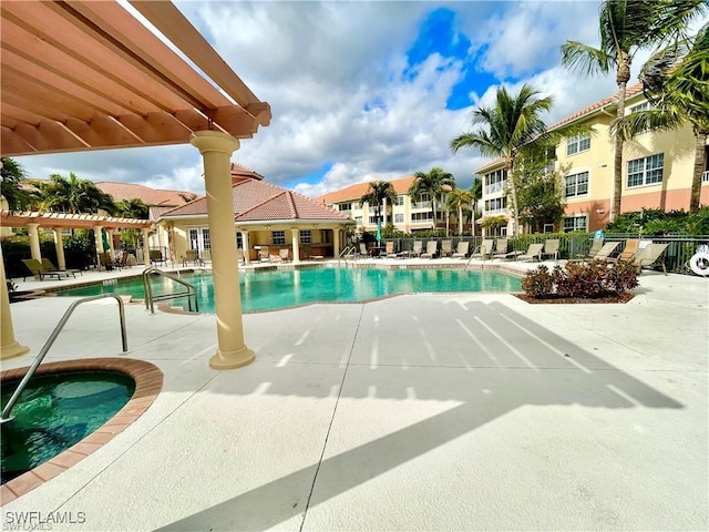 view of swimming pool with a pergola and a patio area