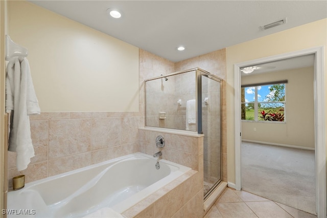 bathroom with tile patterned flooring and plus walk in shower