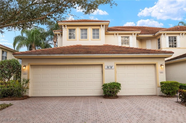 view of front of home with a garage