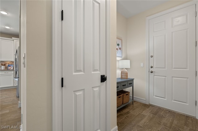 interior space with dark hardwood / wood-style floors